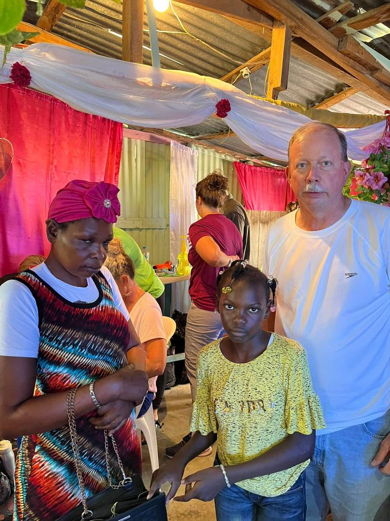 Momma, the little girl, and myself in the Dominican Republic
