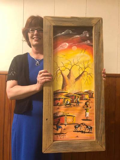 Phyllis won a painting on a drawing she entered