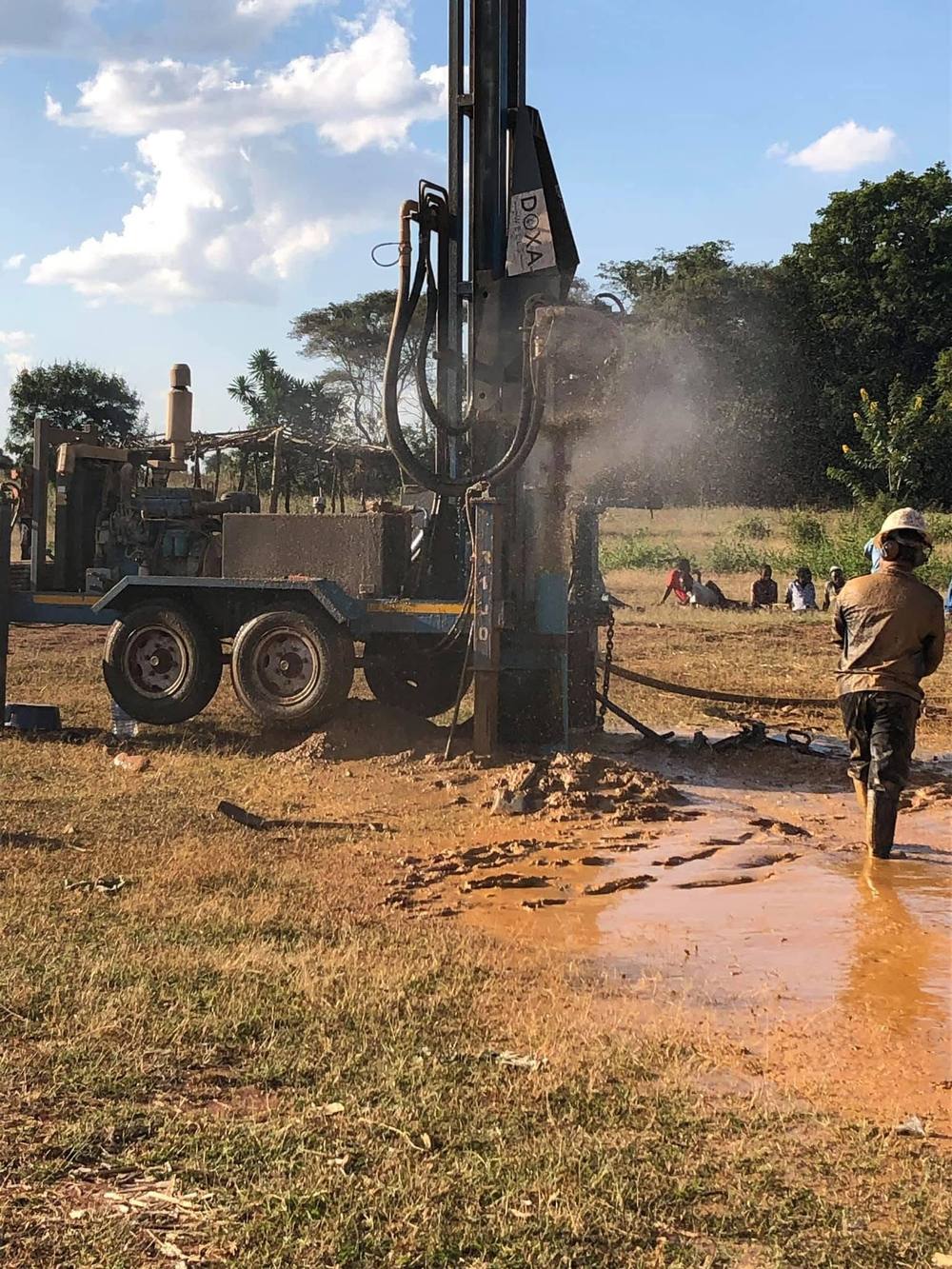 DOXA well drilling company is drilling a well in the village of Bwemba.