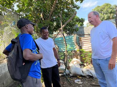 Talking with the village chief about the situation